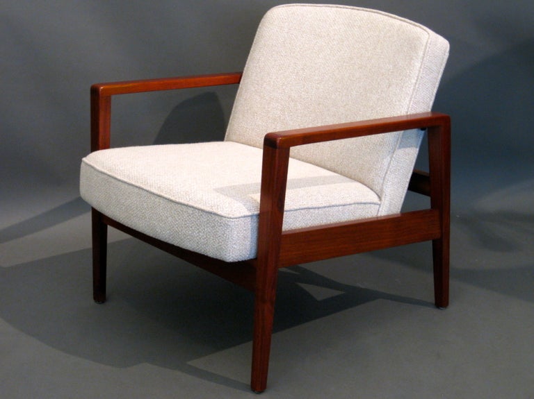 Pair walnut lounge chairs designed by George Nelson for Herman Miller c.1950s. New upholstery. Chairs retain George Nelson/Herman Miller round metal labels.

WEEKLY DELIVERIES TO MANHATTAN FOR APPROVAL OR SALES. STANDARD DELIVERY FEE IS $150.