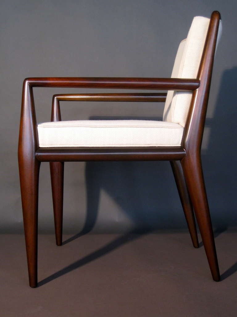 Early T.H. Robsjohn-Gibbings upholstered armchair for Widdicomb circa 1950's. Cloth label. New walnut finish and new herringbone pattern light beige wool upholstery.

Weekly deliveries to Manhattan for approval or sales.  Standard delivery fee of