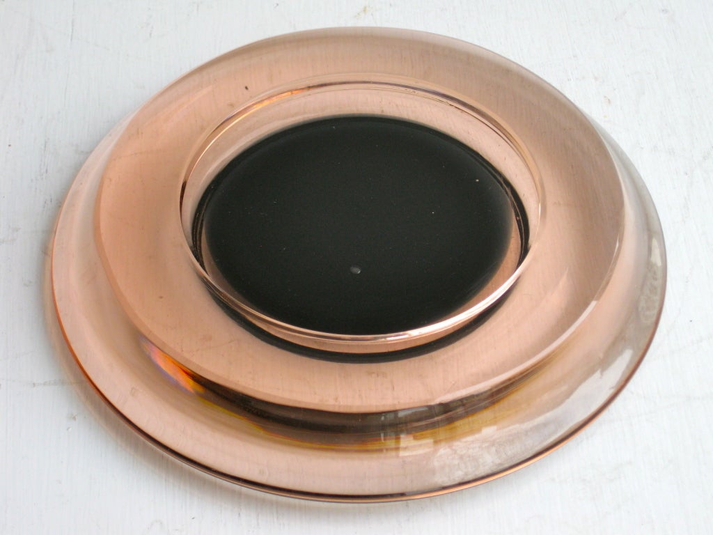 Minimalist glass ashtray designed by Sergio Asti in 1964 and made in Italy by Salviati & Co. In the permanent collection of New York's Museum of Modern Art.

WEEKLY DELIVERIES TO MANHATTAN FOR APPROVAL OR SALES. DELIVERY FEE IS $150.