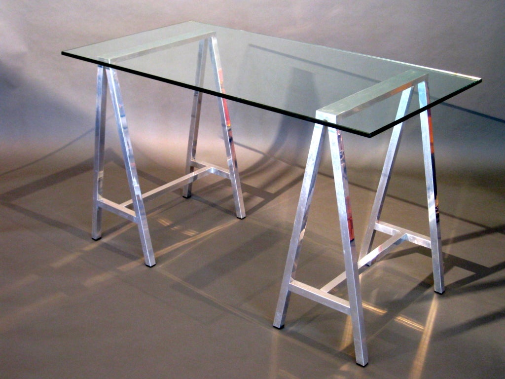 1970s polished aluminum trestle desk/table with sawhorse style aluminum base and 1/2