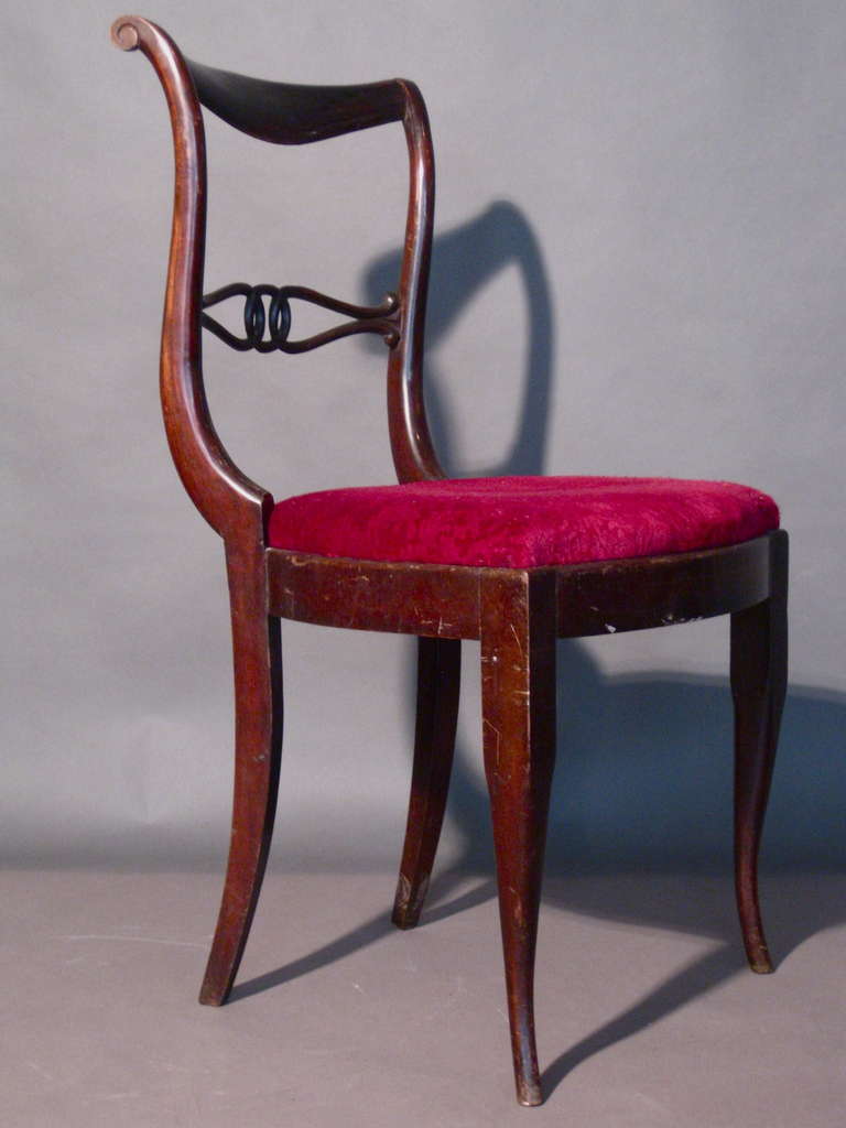 Sculptural dining chairs in hand carved mahogany made in Italy c.1940s in the style of Gio Ponti. Exceptional quality. Original condition.

WEEKLY DELIVERIES TO MANHATTAN FOR APPROVAL OR SALES. STANDARD DELIVERY FEE IS $150.