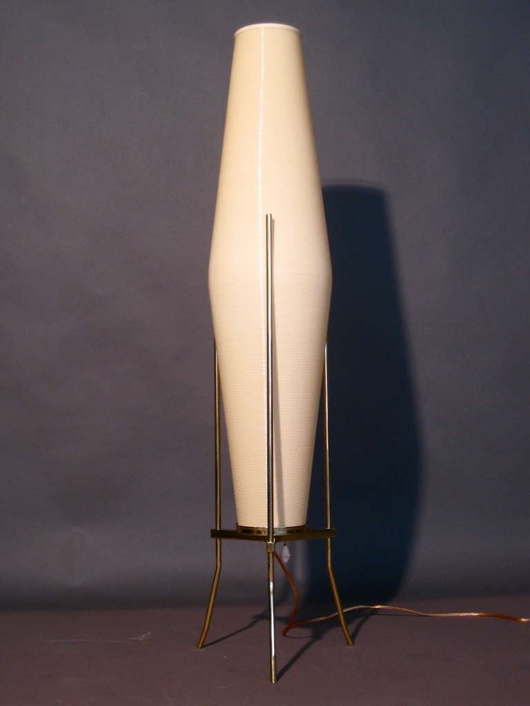 Exceptional Rotoflex table lamp with solid brass tripod base and original sculptural wood pull made by Heifetz c.1960s.

WEEKLY DELIVERIES TO MANHATTAN FOR APPROVAL OR SALES. STANDARD DELIVERY FEE IS $150.