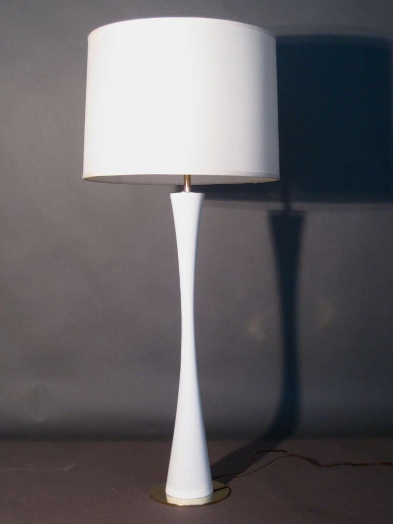 Tall lacquered wood table lamp with solid brass base and cap designed by Stewart Ross James for Hansen c.1960s. Wiring with single socket. Sold without shade.

WEEKLY DELIVERIES TO MANHATTAN FOR APPROVAL OR SALES. STANDARD DELIVERY FEE IS $150.