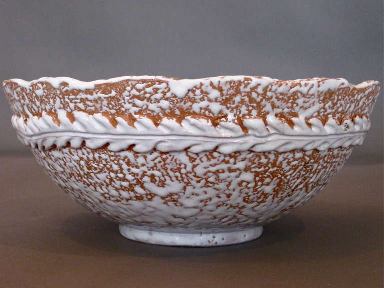 Glazed terracotta centerpiece bowl made by the French firm Primavera c.1940s. Signed.

WEEKLY DELIVERIES TO MANHATTAN FOR APPROVAL OR SALES. STANDARD DELIVERY FEE IS $150.