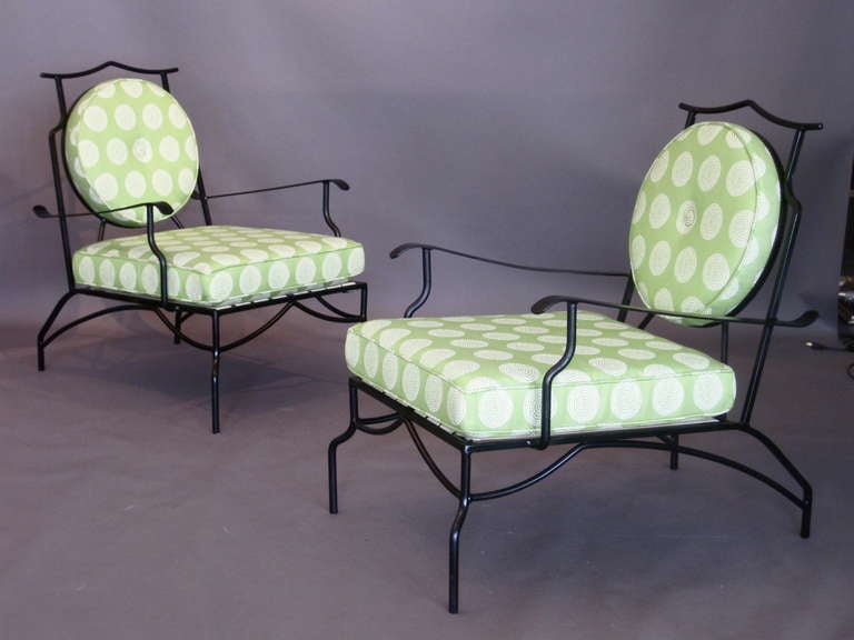 Pair of cast aluminum outdoor/indoor patio lounge chairs with upholstered seat and back in the Asian Modern/Chinoiserie style c.1950s. Repainted and new MAHARAM upholstery.

WEEKLY DELIVERIES TO MANHATTAN FOR APPROVAL OR SALES. STANDARD DELIVERY