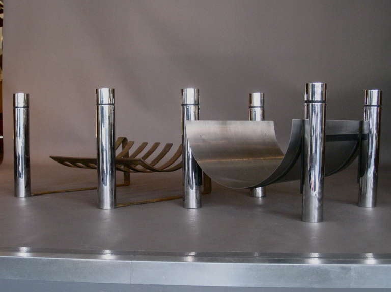 Stainless steel and chromed steel log holder custom designed and fabricated by a Philadelphia architect for a client in the 1970's. En suite with matching andirons (see photos) available together or sold separately.

WEEKLY DELIVERIES TO MANHATTAN