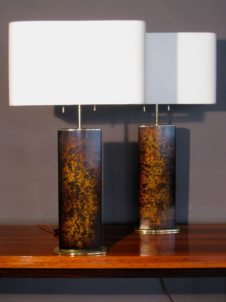 Pair of wooden lamps with tortoise shell oil drop finish and solid brass base and cap made by Mutual Sunset Lamp Co. circa 1960s. Rewired with double cluster brass sockets and brown silk cords. Height of wooden bases only are 16.5