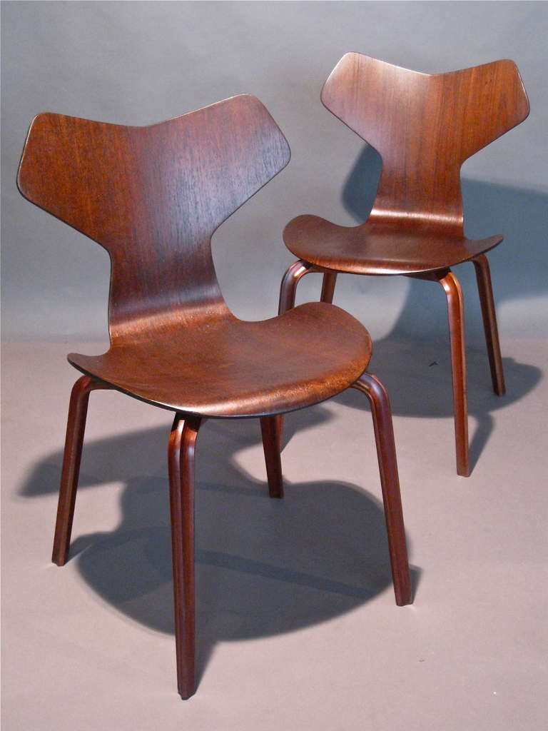 Pair of teak dining chairs designed in 1957 by Arne Jacobsen and subsequently called the 