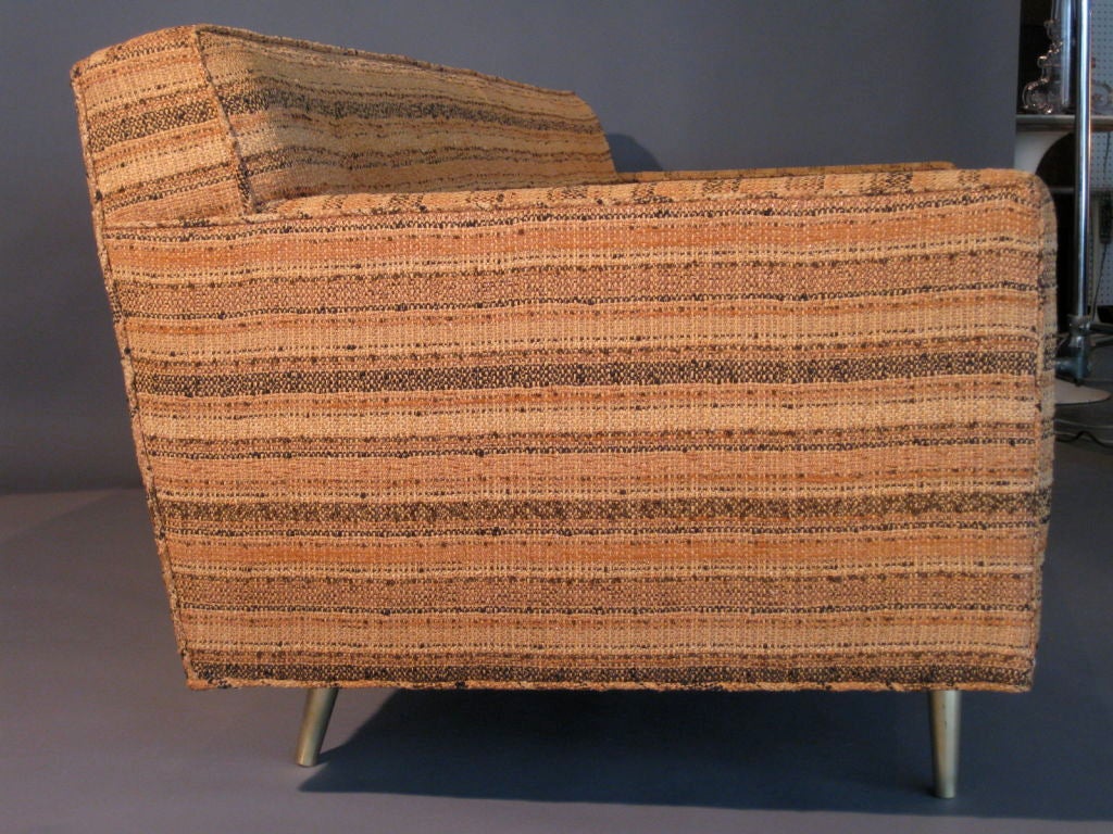 Rare Edward Wormley sofa for Dunbar with solid brass legs and the original upholstery which is a hand woven fabric designed by Dorothy Liebes c.1950's. The extraordinary Dorothy Liebes textile which covers this sofa has many of the Liebes signature