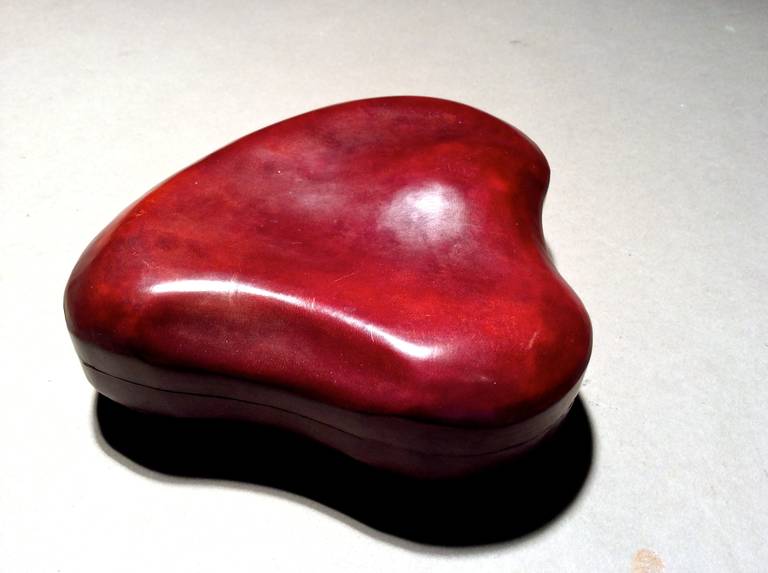 Vintage Elsa Peretti large red leather heart-shaped box for Tiffany c.1970s.

WEEKLY DELIVERIES TO MANHATTAN FOR APPROVAL OR SALES. STANDARD DELIVERY FEE IS $150.