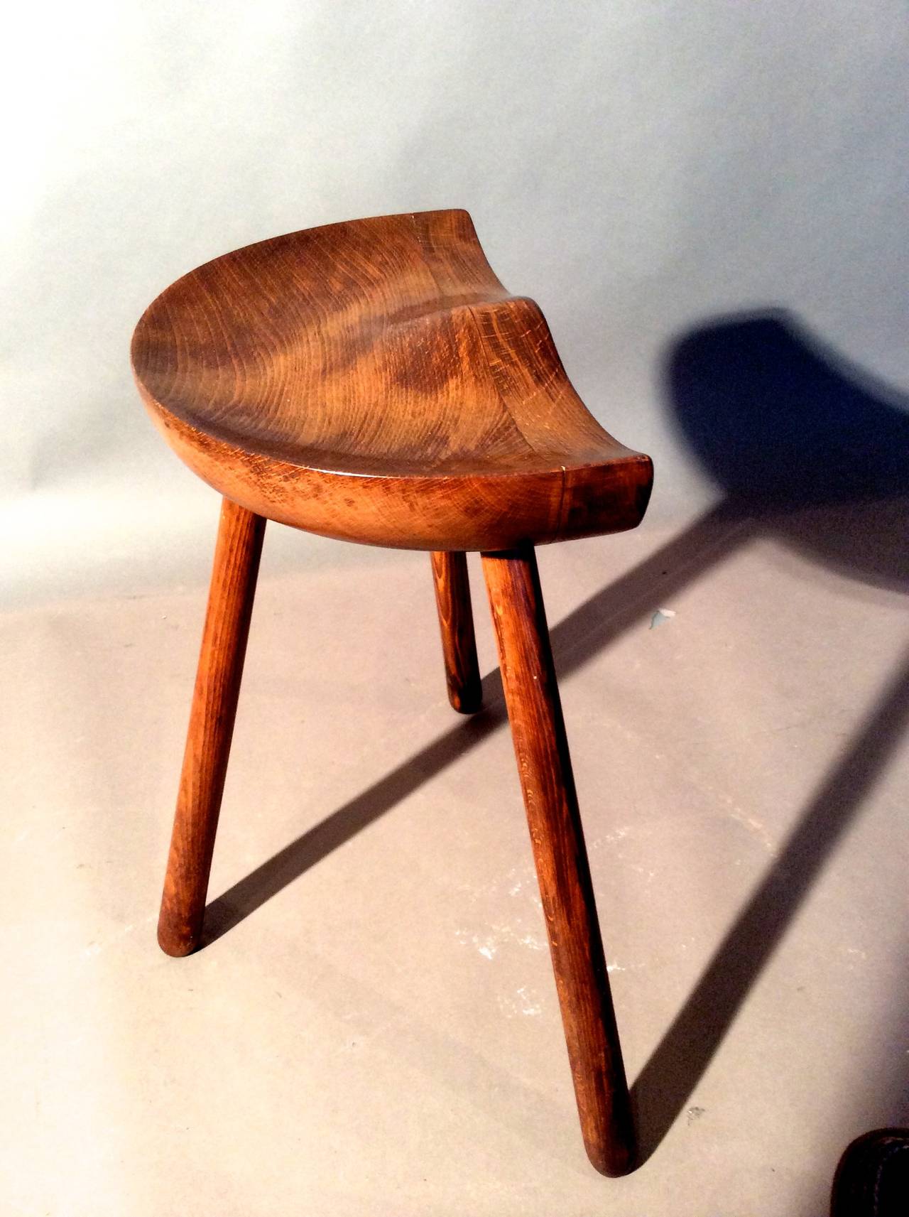Three-legged wooden stool made in Denmark circa 1940s in the style of Mogens Lassen.

Weekly deliveries to Manhattan for approval or sales. Standard delivery fee is $150.