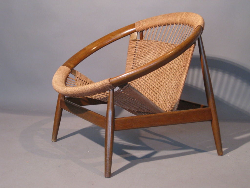 Inventive circular lounge chair of hardwood & rope stamped made in Denmark on the frame c.1960's. Beautiful original condition.<br />
<br />
WEEKLY DELIVERIES TO MANHATTAN FOR APPROVAL OR SALES. DELIVERY FEE IS $100.