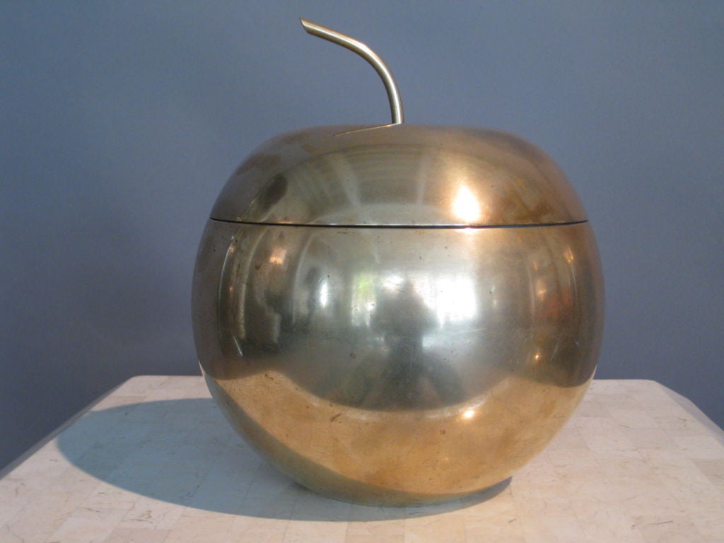 Heavy solid brass ice bucket with mercury glass liner in the shape of an apple made by the Apollo Studios c.1920's. Marked underneath with Apollo Stamp.  Apollo Studios of New York was a division of Bernard Rice's & Sons and pieces marked 