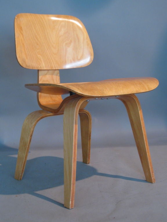 Exceptional all original condition Charles and Ray Eames ash plywood dining chair. The DCW bears the Evans Products/Herman Miller label identifying it as from the two first years of production.

WEEKLY DELIVERIES TO MANHATTAN FOR APPROVAL OR