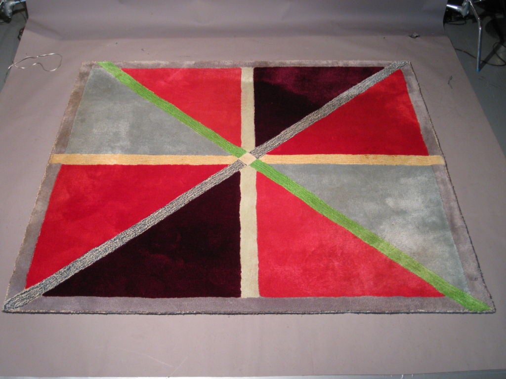 Colorful geometric carpet made by the New York firm Edward Fields. Signed.

WEEKLY DELIVERIES TO MANHATTAN FOR APPROVAL OR SALES. DELIVERY FEE IS $150.