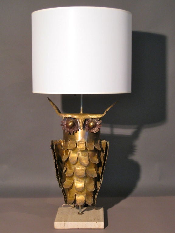 Curtis Jere style torch cut brass owl lamp on travertine base.<br />
<br />
WEEKLY DELIVERIES TO MANHATTAN FOR APPROVAL OR SALES. DELIVERY FEE IS $100.