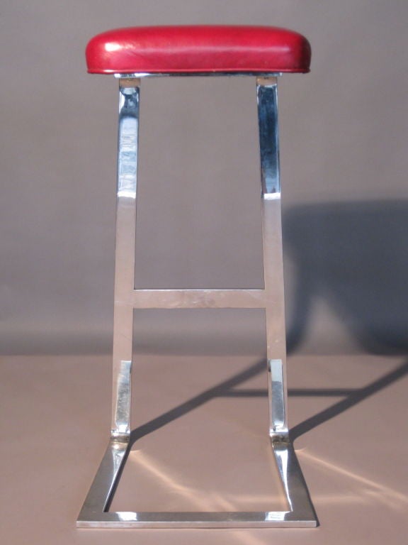 Polished stainless steel bar stool c.1960s with leatherette seat designed by
Milo Baughman.

WEEKLY DELIVERIES TO MANHATTAN FOR APPROVAL OR SALES. DELIVERY FEE IS $150.