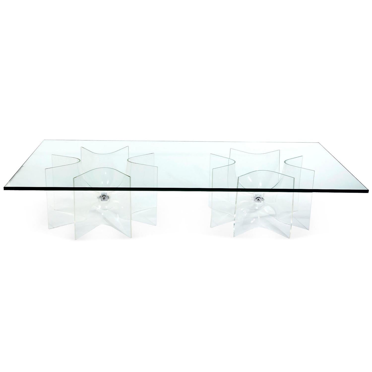 A Large Plexi Glass Based Cocktail Table