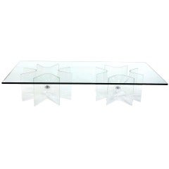 A Large Plexi Glass Based Cocktail Table
