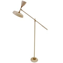 A Mid Century Floor Lamp in Brass and Lacquered Metal