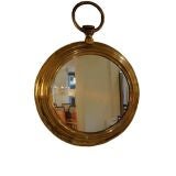 A Round Brass Framed Wall Mirror