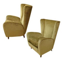 A Pair of Club Chairs by Paolo Buffa