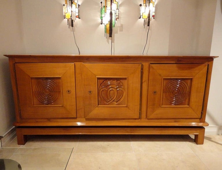 A Three Door Sideboard by Martel and Burkhalter
