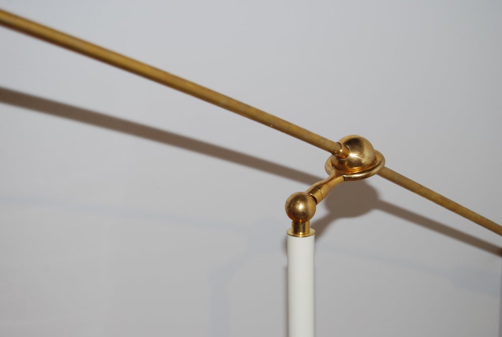 A Brass and Lacquered Metal Floor Lamp by Stilnovo