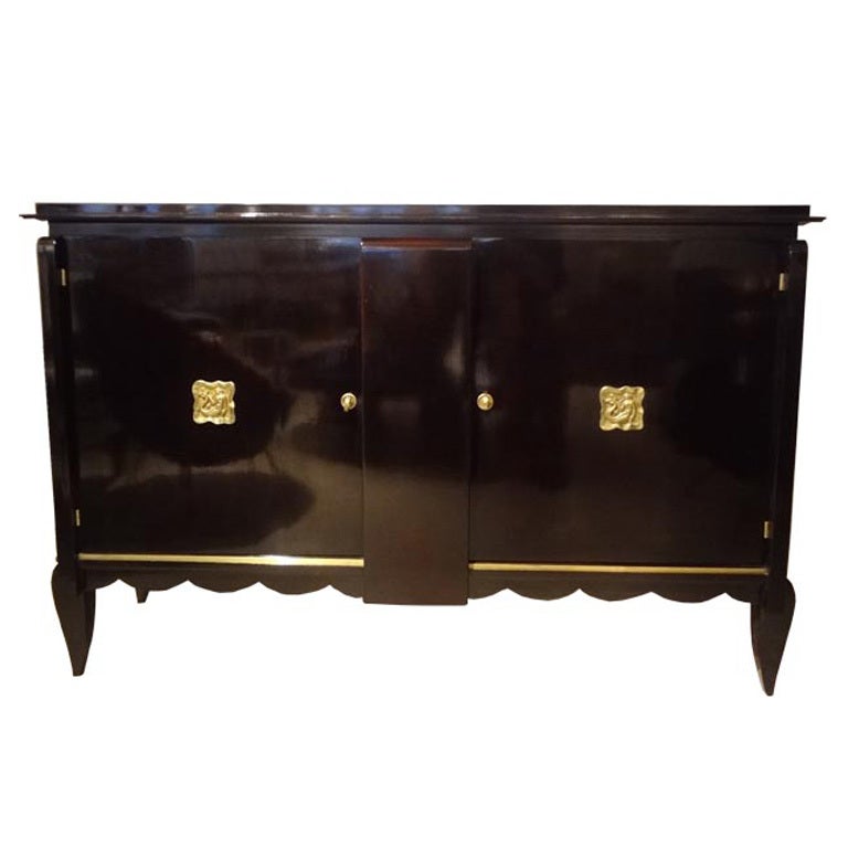 A Two Door Art Deco Sideboard in the style of Andre Arbus