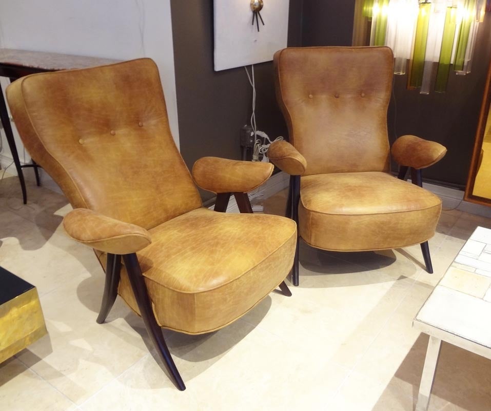 A Pair of Club Chairs, Model "Penguin", by Theo Ruth