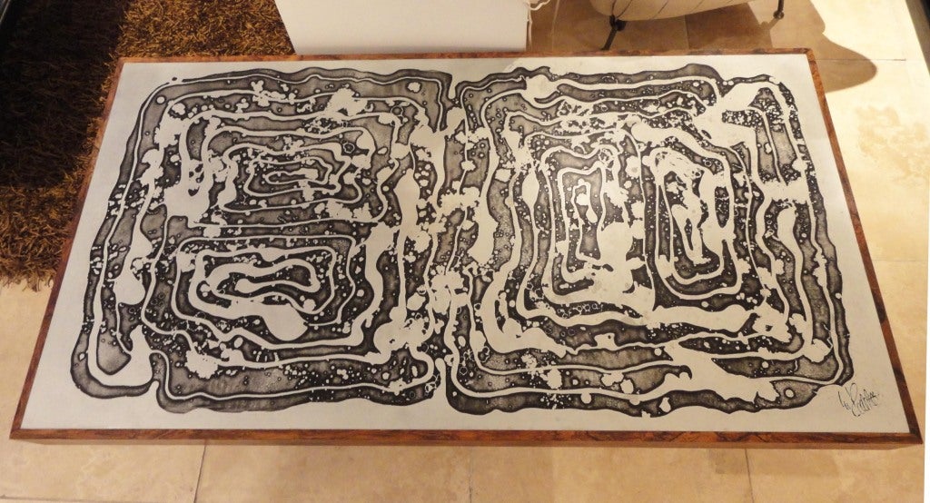 A Large Scaled Cocktail Table in Acid Etched Steel and Rosewood