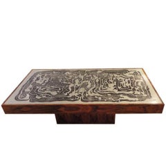 A Large Scaled Cocktail Table in Acid Etched Steel and Rosewood