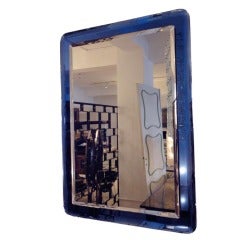 A Rectangular Wall Mirror in the style of Fontana Arte
