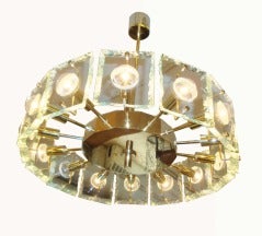 A Fourteen Light Chandelier in Brass and Crystal by Fontana Arte