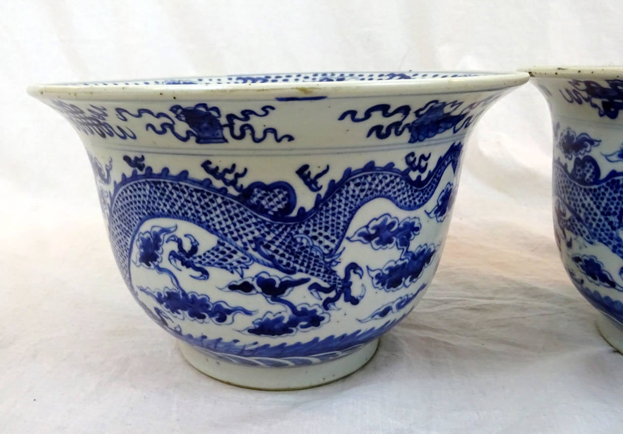 Pair of 19th Century Blue and White Cache Pots on Wooden Stands