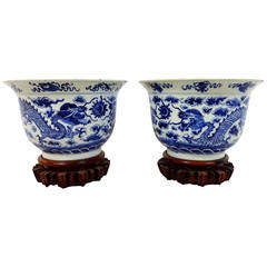 Pair of 19th Century Blue and White Cache Pots on Wooden Stands