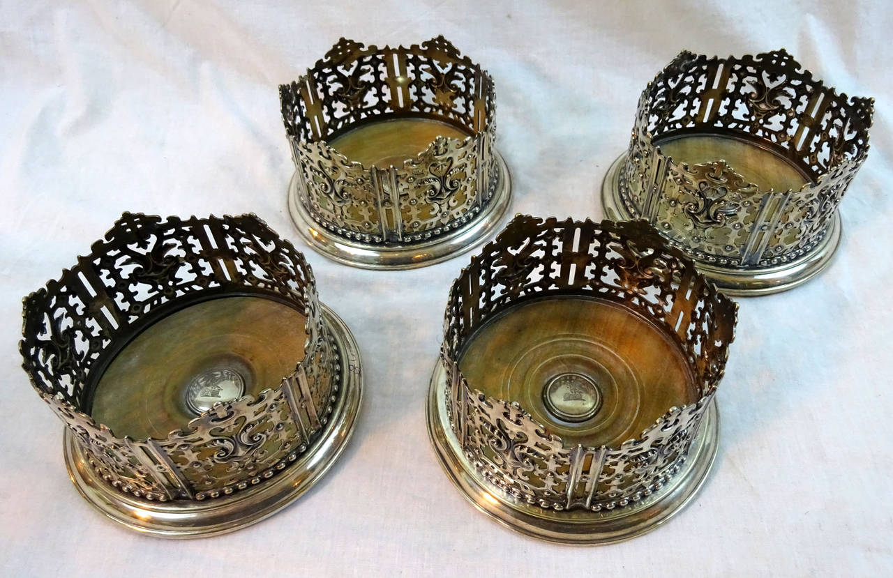 English Mid-19th Century Set of Four Silver Plated Wine Coasters by Elkington & Co.