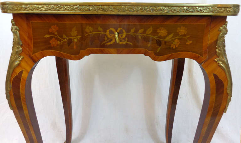 Small Table Vanity with Marquetry and Bronze Mounts, with a locking flip-up lid with mirrored interior and slide out drawer.  Provenance:  Manheim Galleries, New Orleans, LA.