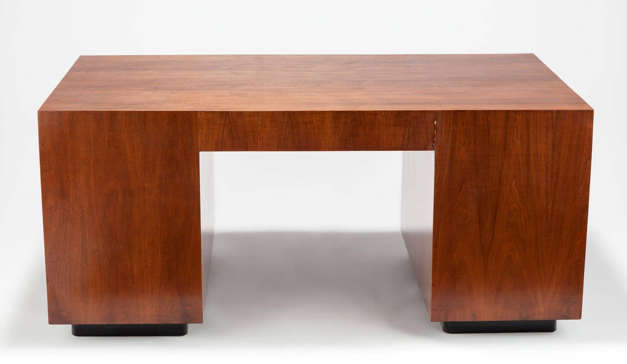 Gilbert Rohde (American, 1894-1944) Executive Desk, Herman Miller, Walnut, brass handles.

Rohde, Gilbert: Rohde was the beginning of modern furniture design at Herman Miller, he had argued with the founder, Dirk Jan De Pree, that the then current