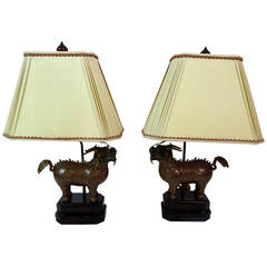 Pair of 20th Century Chinese Foo Dog Figure Lamps
