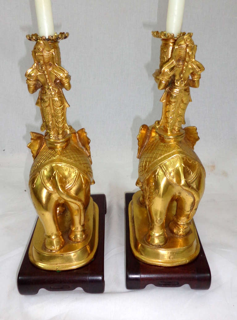 Pair of Bronze Doré Candlesticks on wooden bases 1