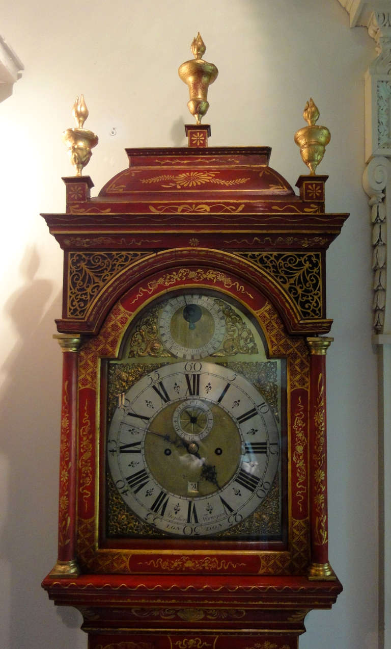 George II scarlet and gilt Japanned long-case Clock, redecorated. Signed, Stephen Horogood, London. Decorated with Chinoiserie Vignettes.