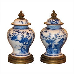 Pair of Chinese Blue and White Jars with Lids and Ormolu Mounts Pair of Chinese Blue and White Jars with Lids and Ormolu Mounts