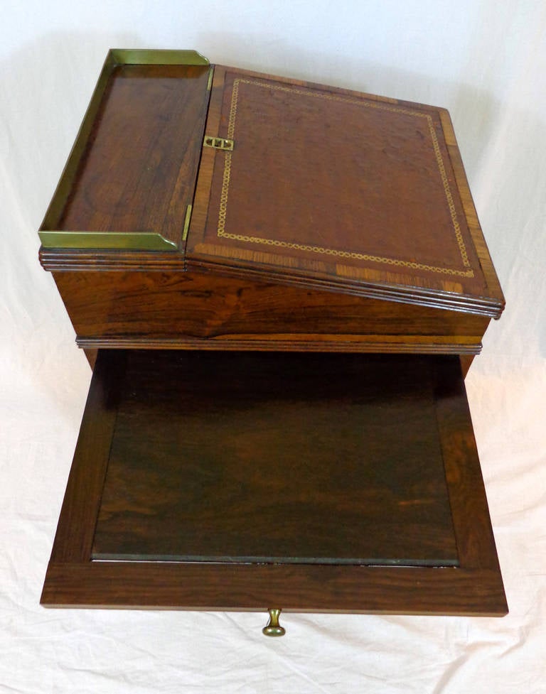 Exceptional Figured Rosewood Davenport (Writing Desk) with original brass hardware, four locking drawers, two slide-out surfaces, and a fold out slanted writing surface.