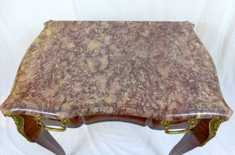 Louis XV style writing table with kingwood parquetry and bronze doré mounts, stamped 