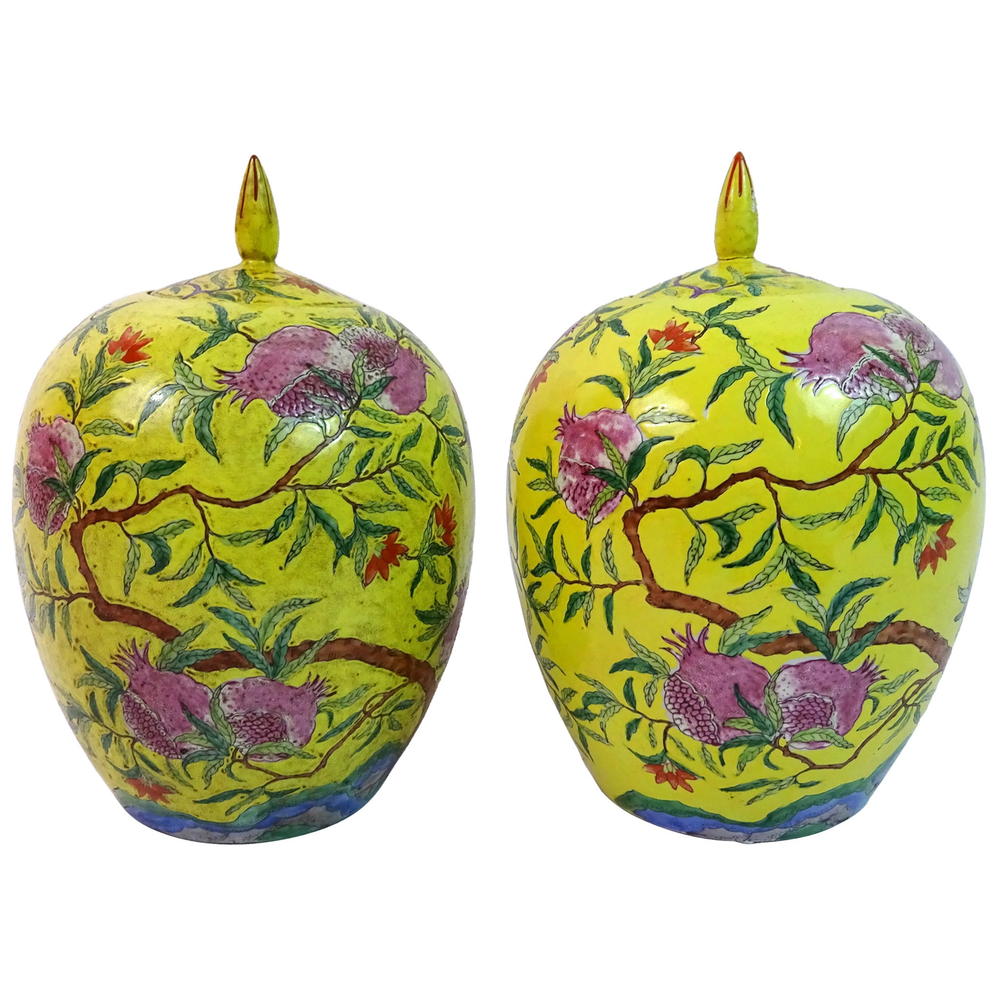 Pair of Early 20th Century Chinese Famille Jaune Covered Vases