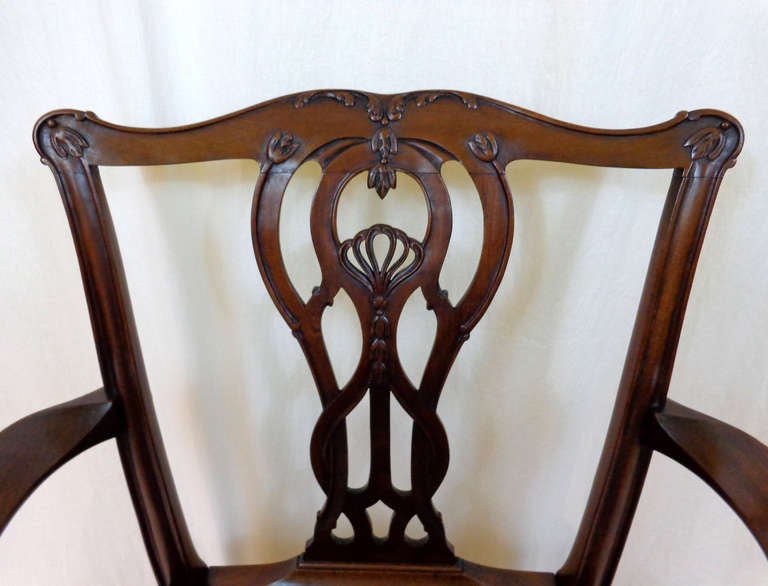 Chippendale Style Mahogany Armchair with black leather seat and nailhead trim.