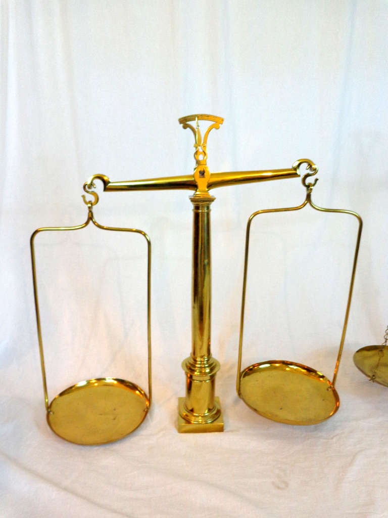 Two sets of brass scales from England, most likely used in pharmacy.  Priced $1,360.00 each.