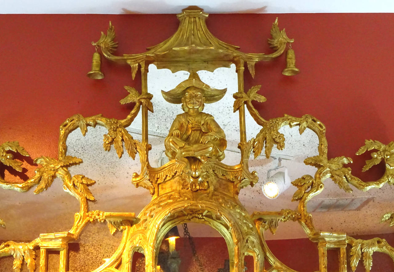 Hand carved gilt wood Chinoiserie mirror frame inspired by the Badminton Overmantle once owned by the tobacco heiress Doris Duke.