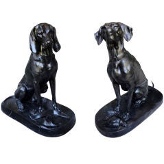 A Pair of Life Size Cast Iron Hunting Dogs